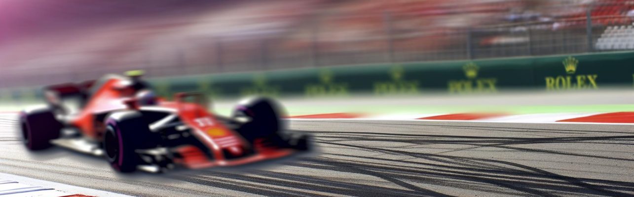 Une voiture de Formule 1 en mouvement sur un circuit avec des bordures rouges et blanches sous un ciel ensoleillé.