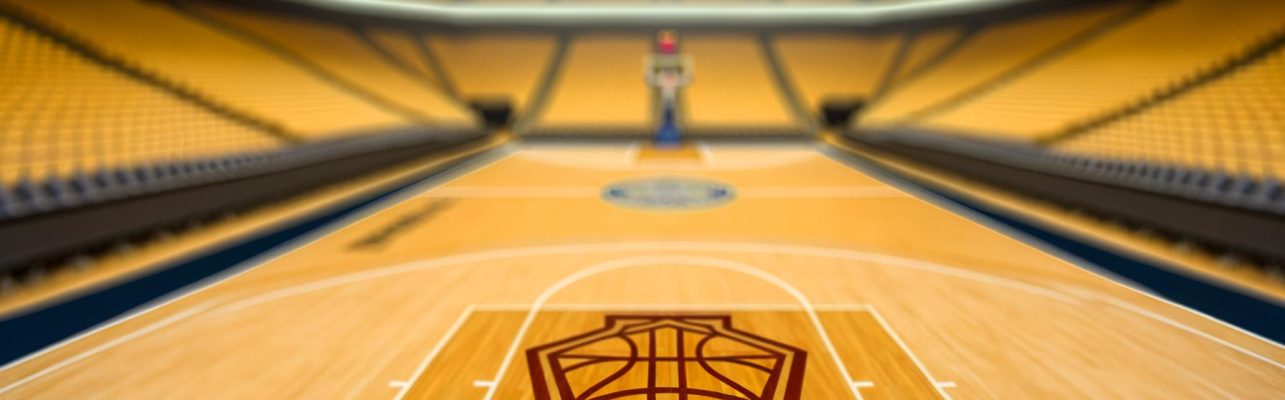Un terrain de basketball professionnel vide avec logo central et parquet en bois dans un stade, sièges flous en arrière-plan.
